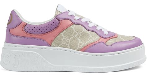 purple Gucci sneakers